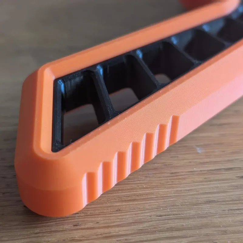 Detailed look at handle contour of Beyblade X Angled Skelethal Proto Launcher Grip for ergonomic support