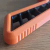 Detailed look at handle contour of Beyblade X Angled Skelethal Proto Launcher Grip for ergonomic support