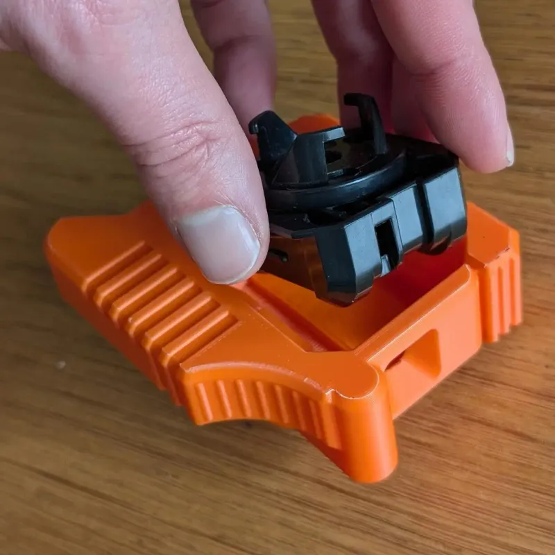 Installation view of Beyblade X Bakuten Left Proto launcher grip onto stock Proto launcher