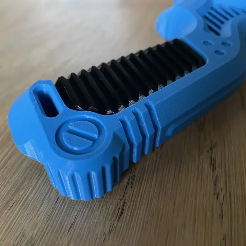 Beyblade X Bakuten-style grip detail of the handle texture : lines are carved into the ruber