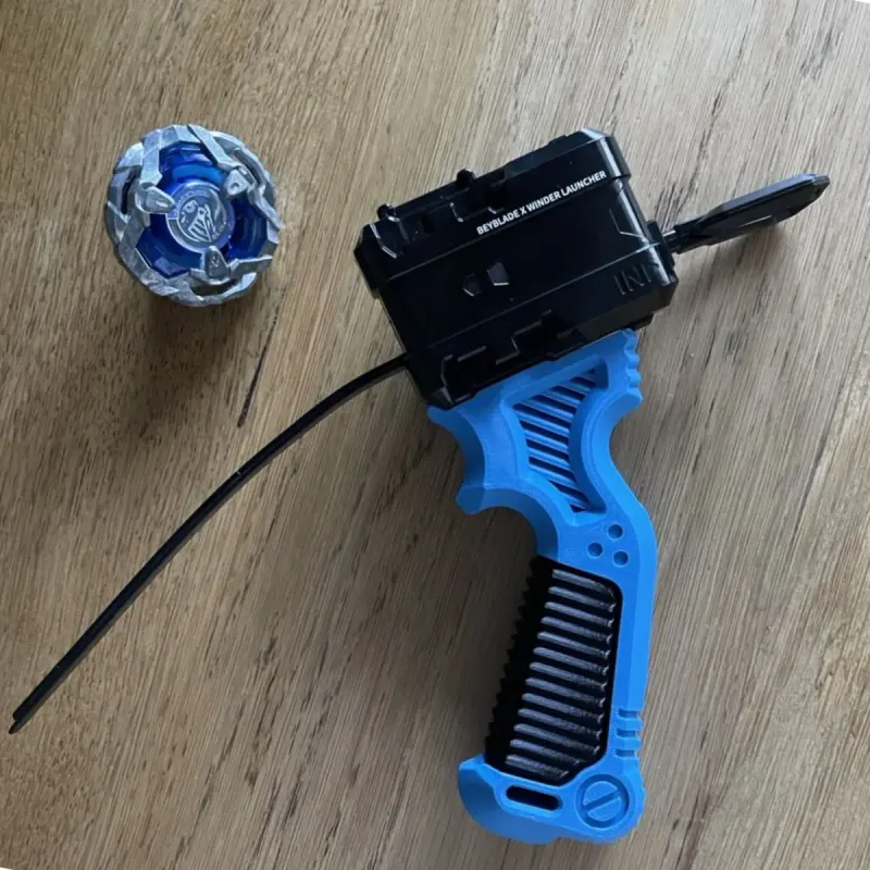 Beyblade X Bakuten-style winder launcher grip mounted on launcher, from above