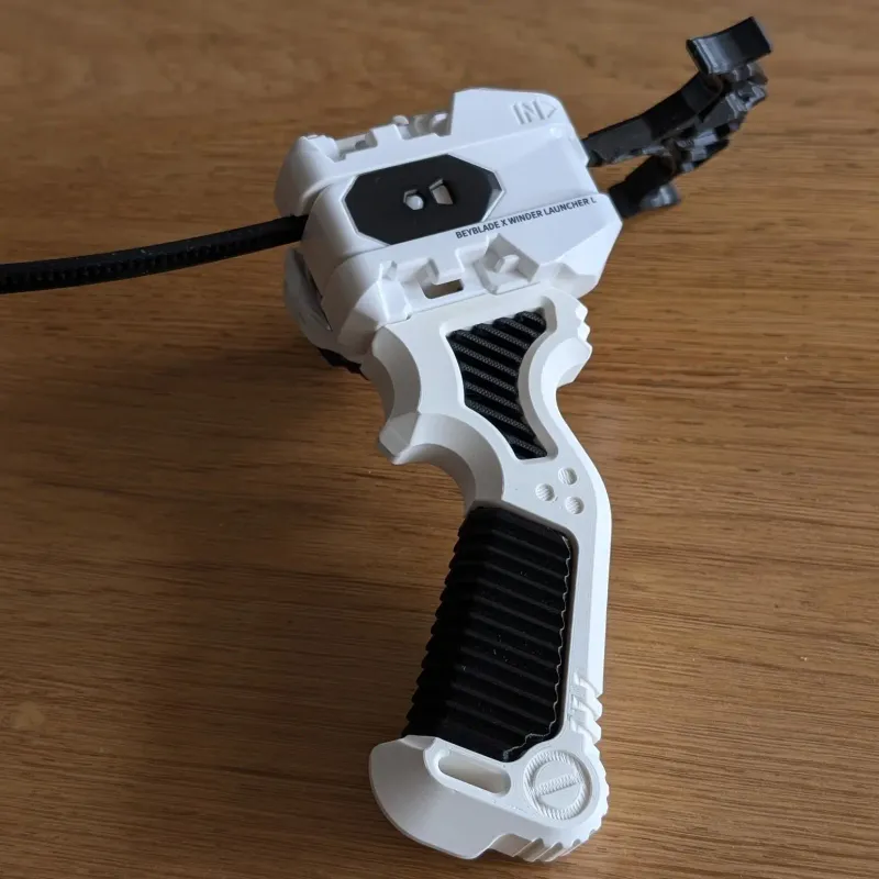A wide view of Beyblade X 3D printed launcher grip, with coloured vent and handle details