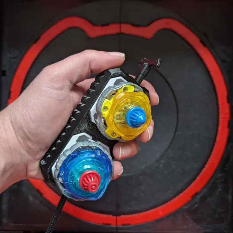 Beyblade X inline dual launcher grip held in hand during dual launch