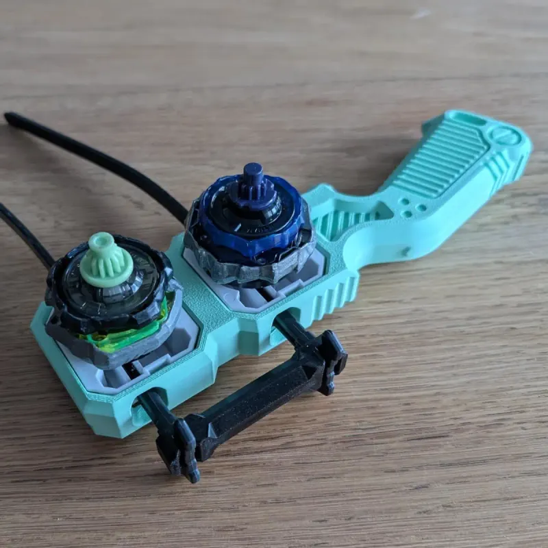 Beyblade X dual proto launcher grip angled underside view with two beyblades mounted, ready to fight