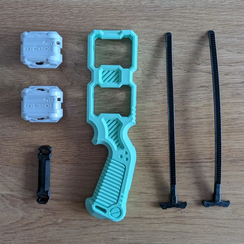 Beyblade X dual proto launcher grip exploded view showing components for assembly : two proto launchers, two ripcords, one ripcord link