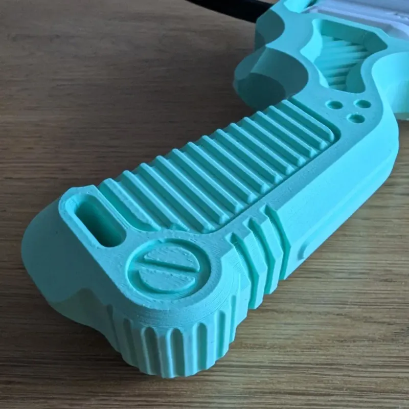 Beyblade X dual proto launcher grip handle texture close-up for ergonomic grip