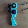 Beyblade X dual proto launcher grip bottom view showing structural design