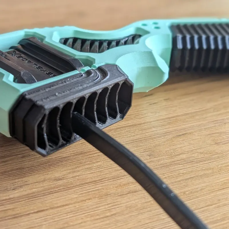 Close-up of front vent detail on Inline Modular Dual Proto Launcher Grip for airflow