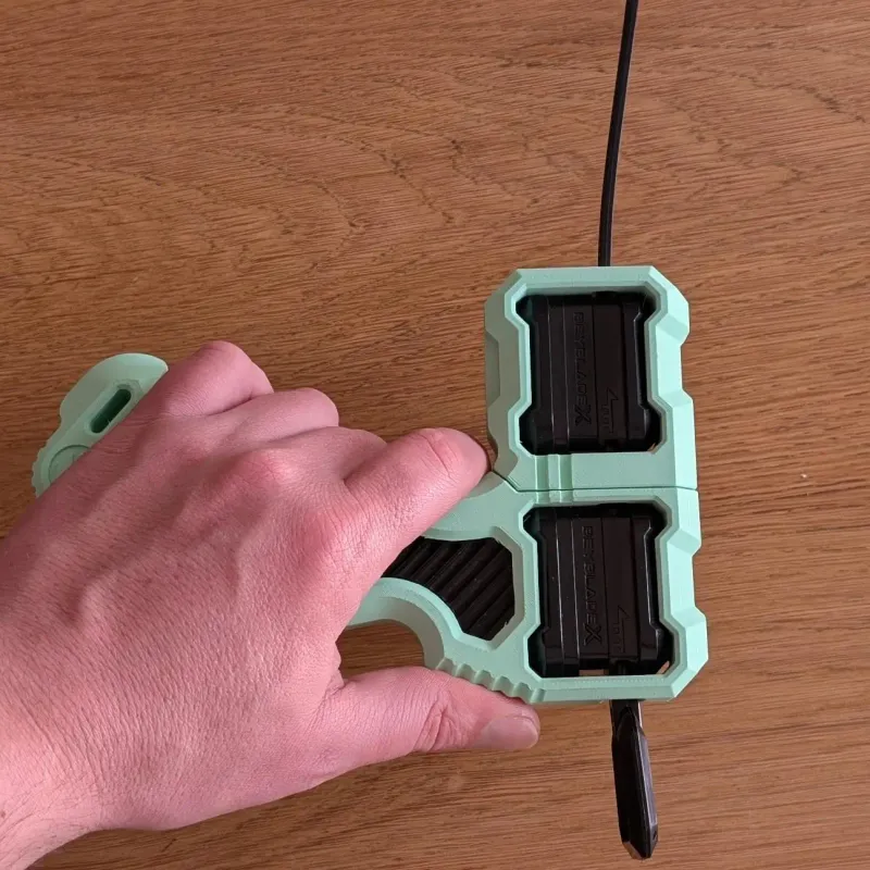 Ergonomic left-hand grip demonstration of Inline Modular Dual Proto Launcher Grip