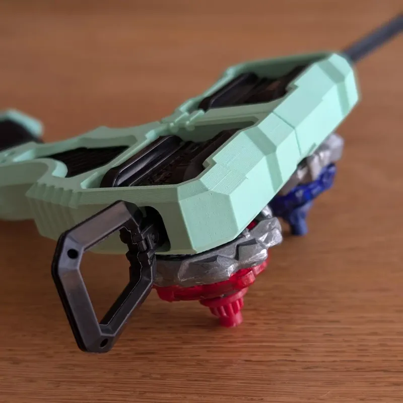 Inline Modular Dual Proto Launcher Grip positioned with two Beyblade X tops ready to launch