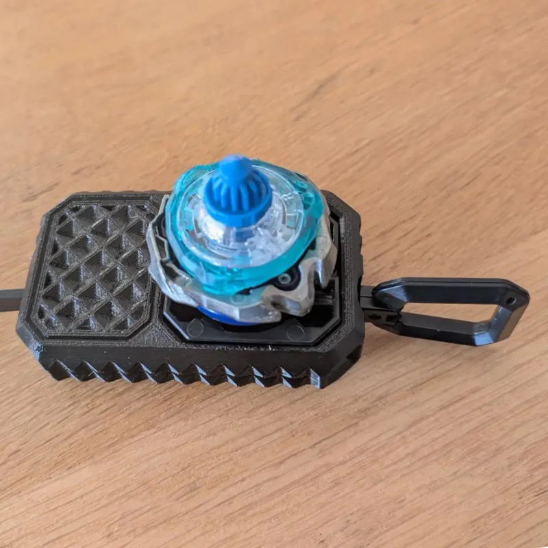 Beyblade X Inline Proto Launcher Grip mounted with Beyblade X attached underside perspective
