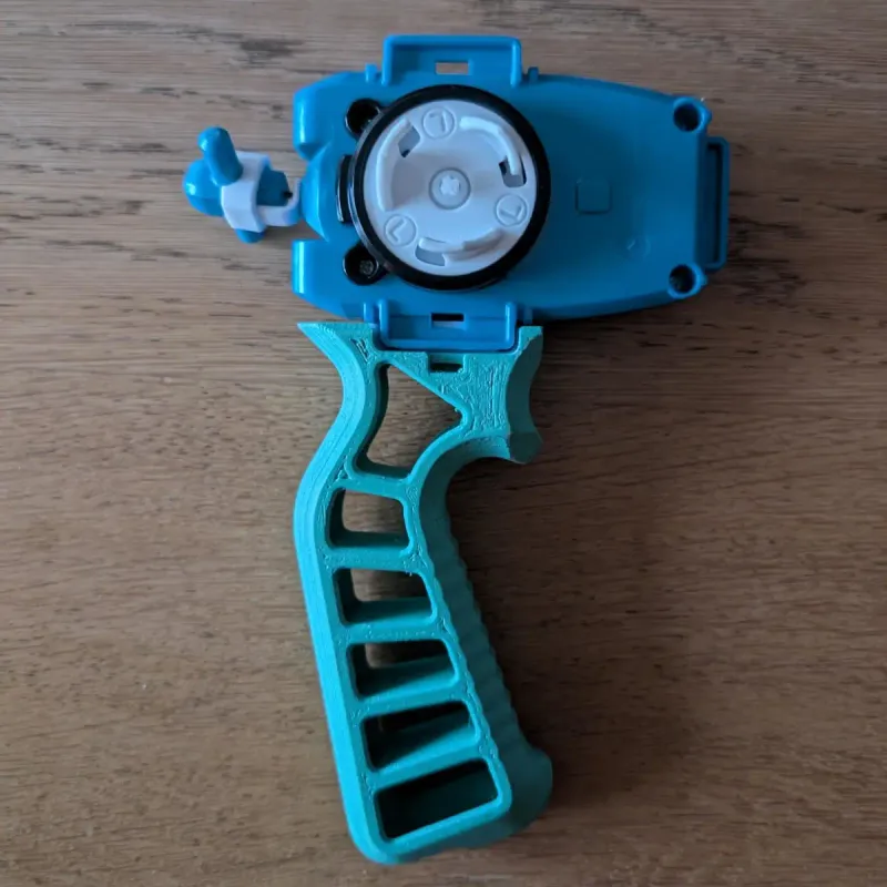 Underneath detail of Beyblade X Skelethal Winder Launcher Grip with mounting tabs