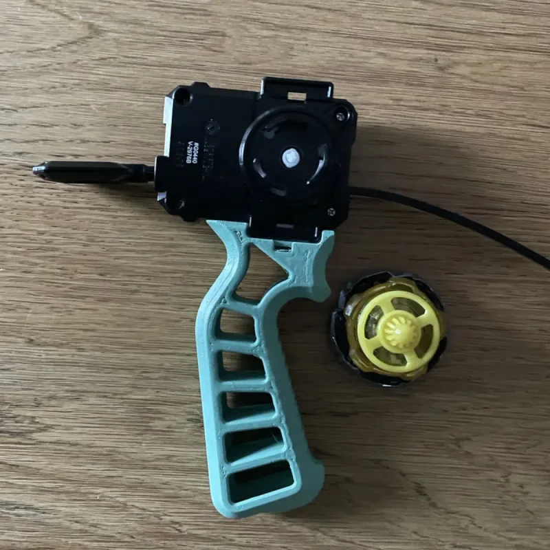 Bottom view of Beyblade X Skelethal Winder Launcher Grip showing mounting interface