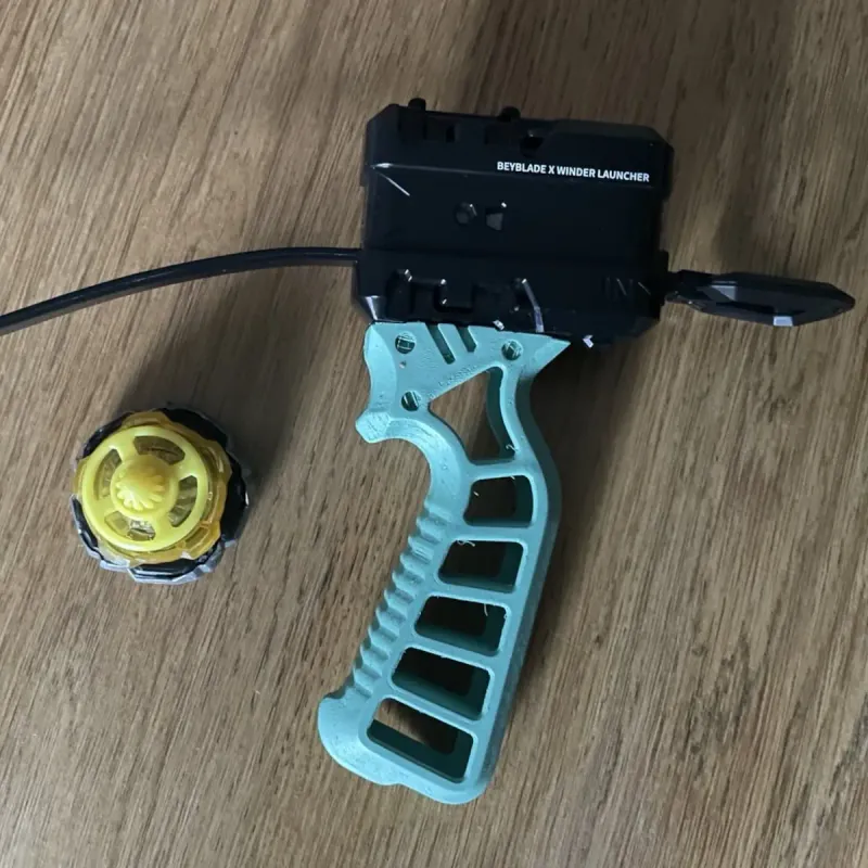 Top view of Beyblade X Skelethal Winder Launcher Grip, flat surface detail