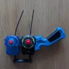 Beyblade X Double Winder Launcher Link bottom view attached to two winder launchers with Beys installed